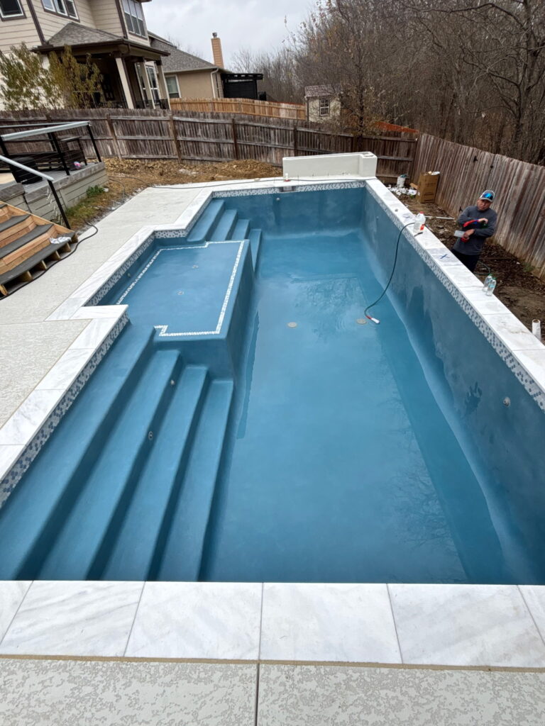 Custom pool with new plaster finish in Bee Cave, TX by Renaissance Pools